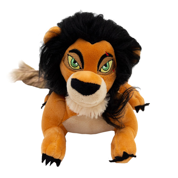 A plush toy resembling Scar from Disney's The Lion King, a villainous character with a dark mane and famous scar, made into a dog toy with a squeaker inside.
