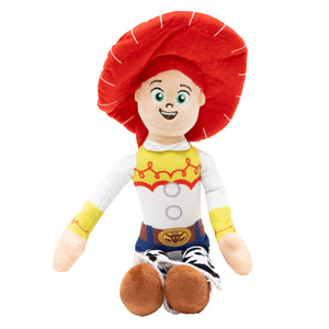 Plush toy resembling a Jessie character from Toy Story with a red hat and colorful outfit on a white background