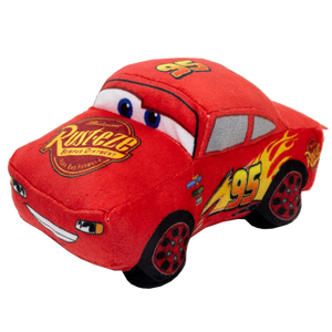 Red plush toy car with a smiley face on a white background