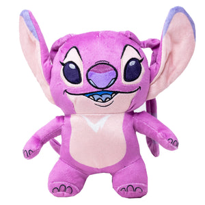 Plush toy Stitch from Disney with large ears and a purple face on a white background