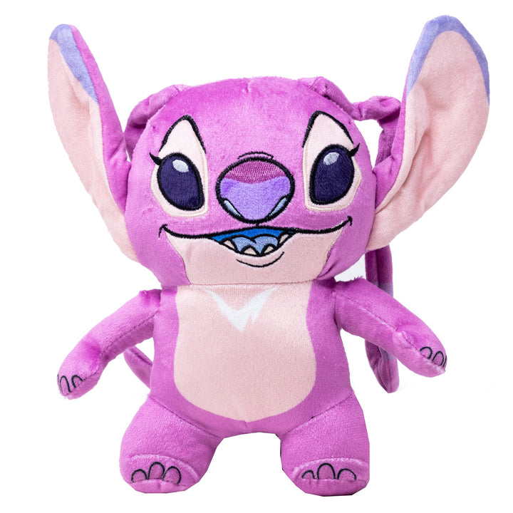Plush toy Stitch from Disney with large ears and a purple face on a white background