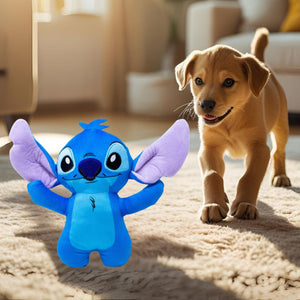 Dog playing with a blue Stitch plush toy in a living room.